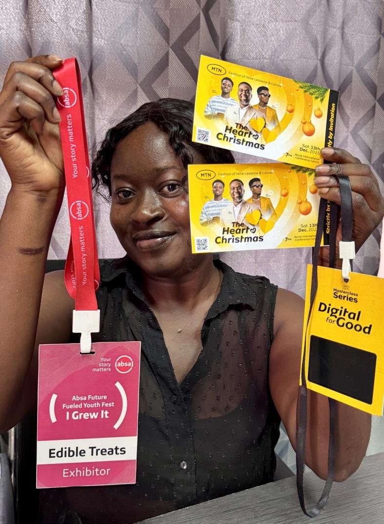 A colleague holding branded lanyards, an ID tag and promotional cards